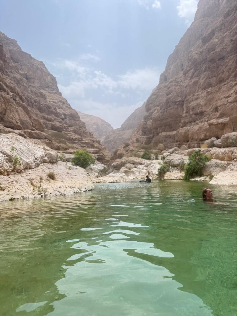 Dutch group crossing to Wadi Shab by boat Oman tour