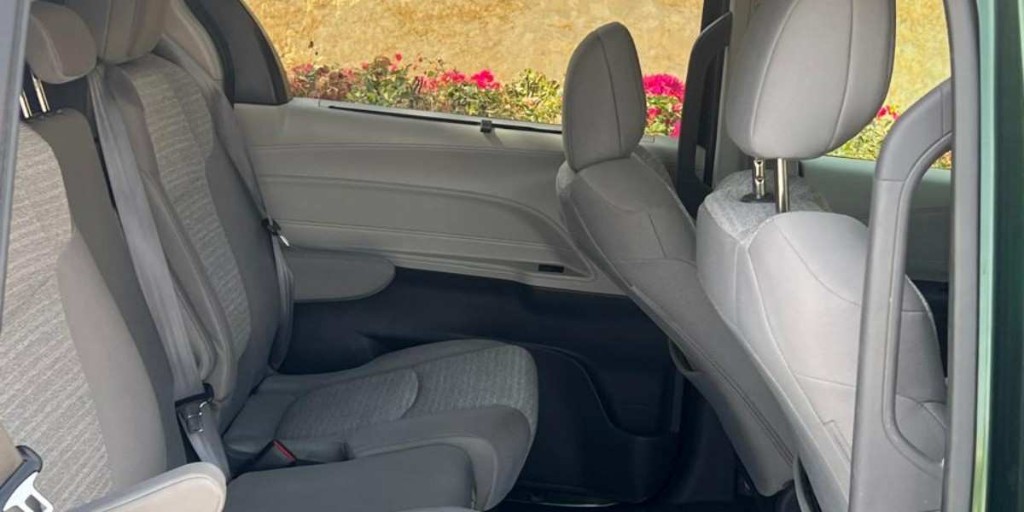 Comfortable captain seats inside OmanTour private transfer vehicle