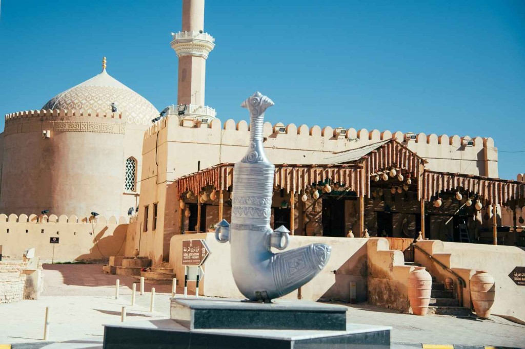 Historic Omani fort heritage site under blue sky