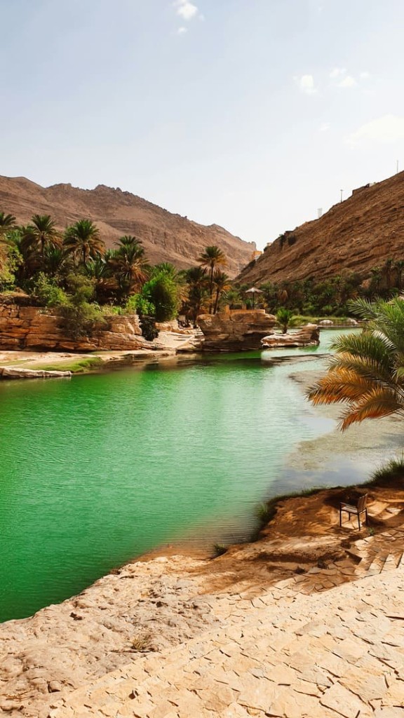 Emerald wadi pools on a private Oman travel tour