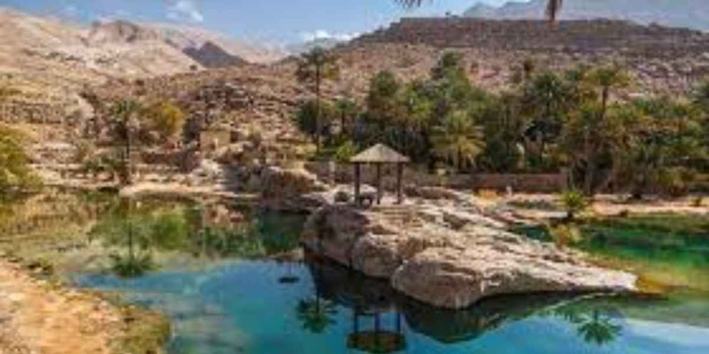 Wadi Shab canyon swimming — water shoes and quick-dry clothing essential