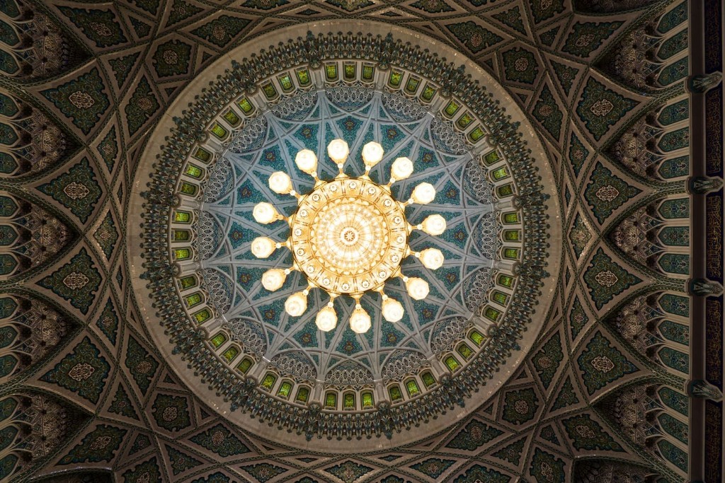 Interior dome and golden chandelier of Sultan Qaboos Grand Mosque Muscat