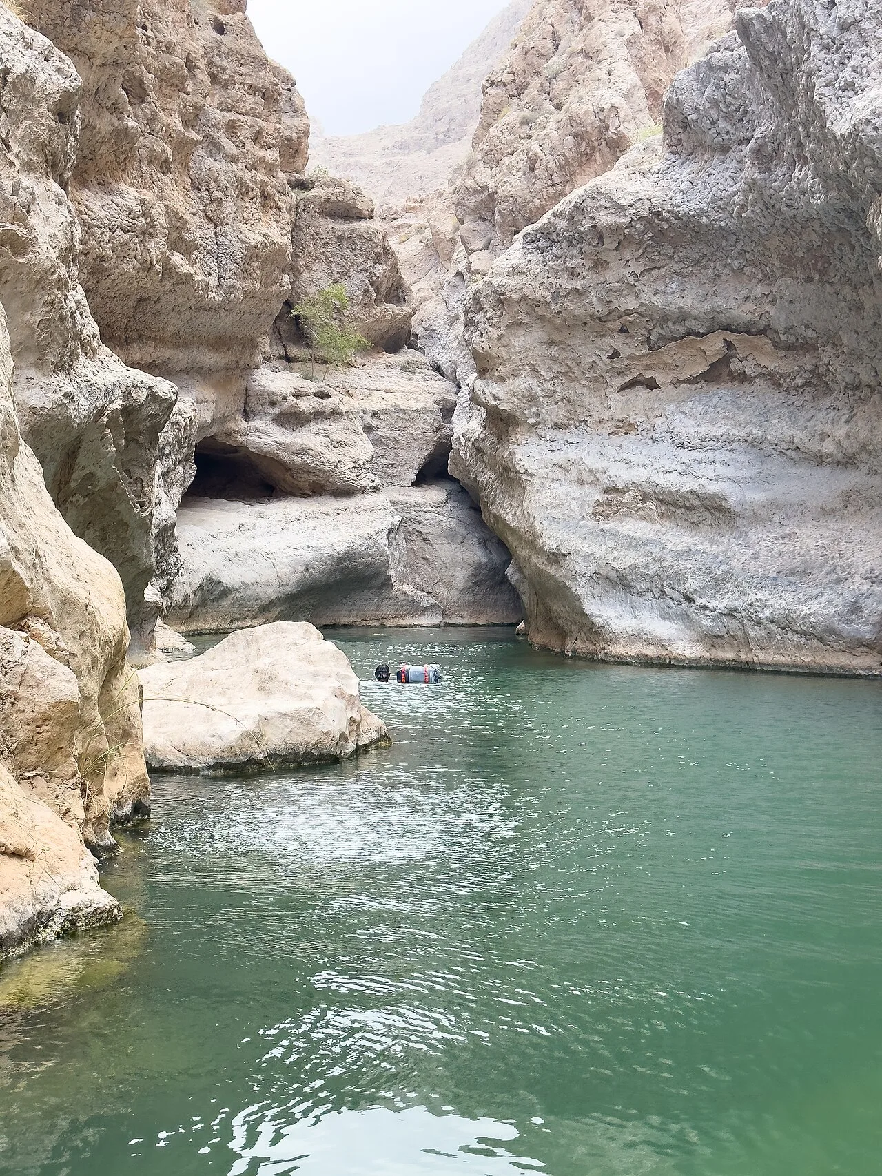 Turquoise pools at Wadi Shab canyon in Oman